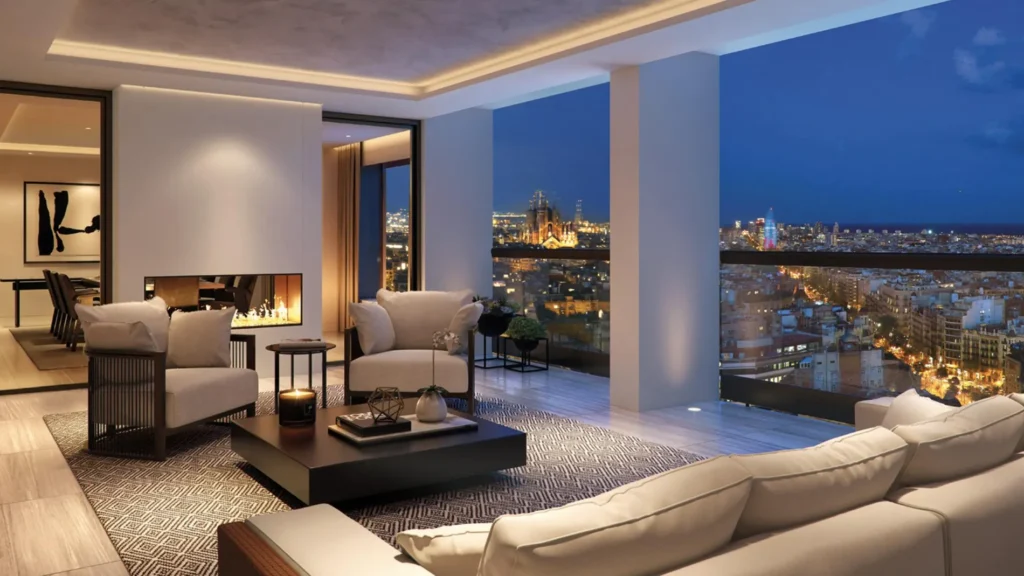 Salón con vistas nocturnas a la ciudad